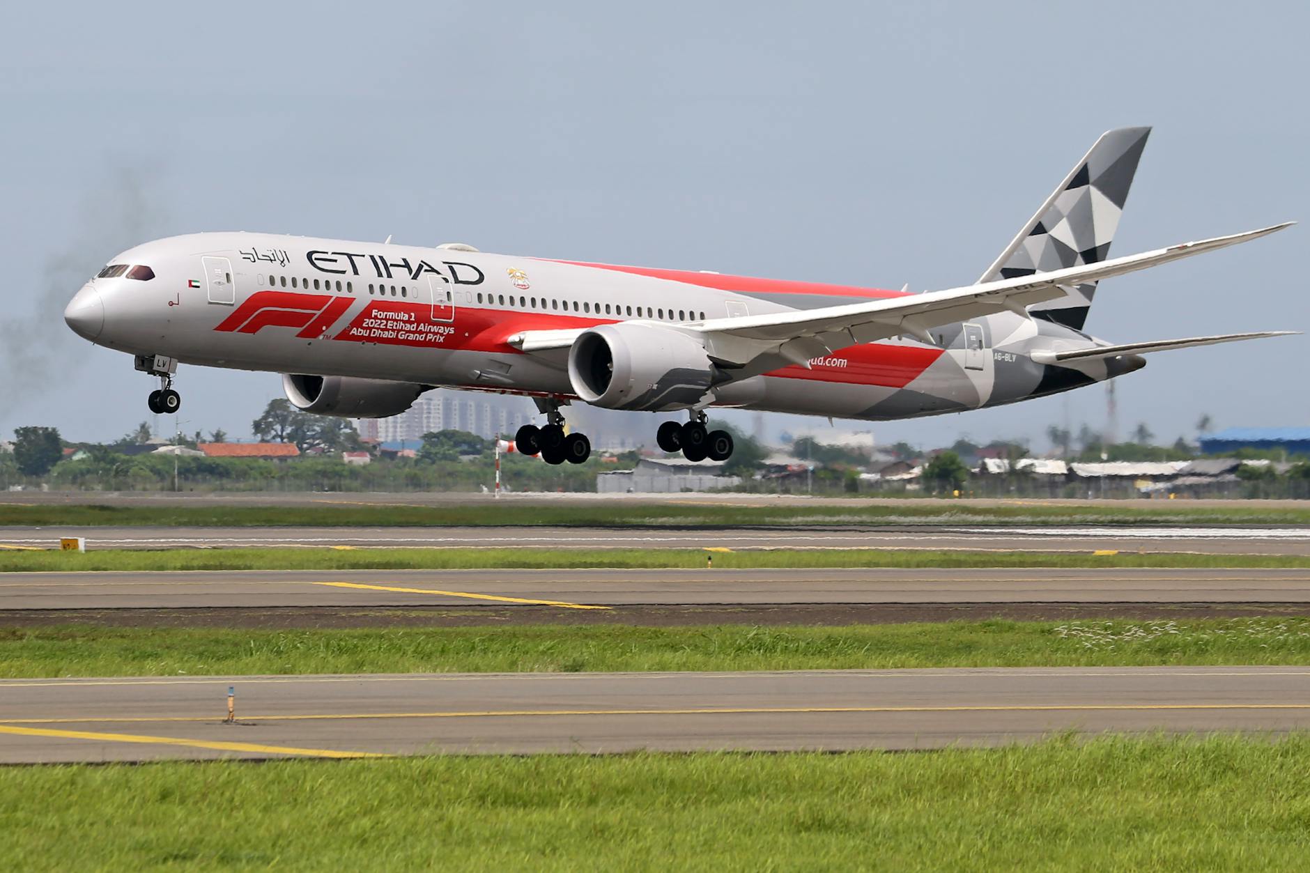 an airplane landing on runway