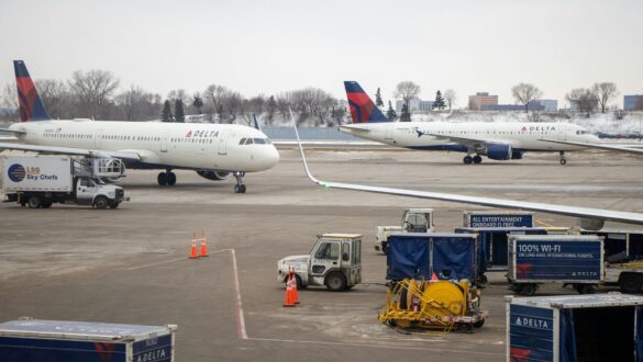 white passenger plane on airport
