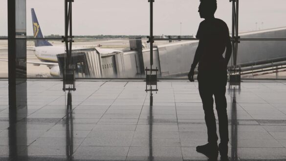 silhouette of man inside concrete building