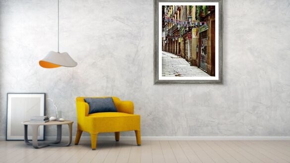 A Taste of Havana in Barcelona's Historic Streets Colorful Flags in Charming Alley Framed Print