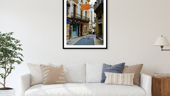 Catalan Flag and Reflections on a Street Corner in Sitges, Spain Framed Print