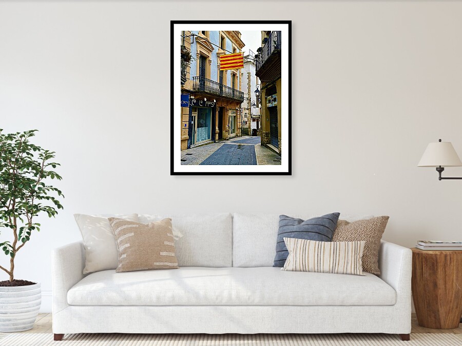 Catalan Flag and Reflections on a Street Corner in Sitges, Spain Framed Print