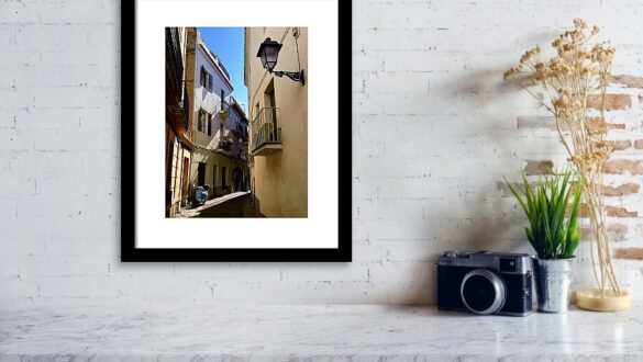 Charming White-Walled Alley with Scooter, Sitges Old Town, Spain Framed Print