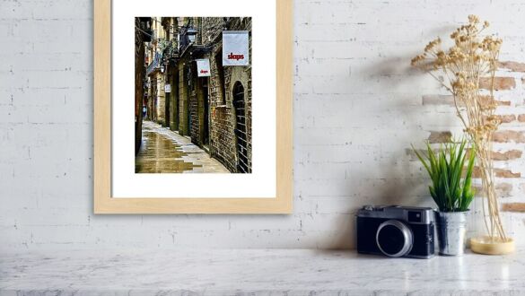 Rainy Day Charm in Barcelona's Gothic Quarter Framed Print