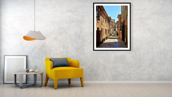 Sunlit Stone Alley in Alcudia Old Town, Majorca Framed Print