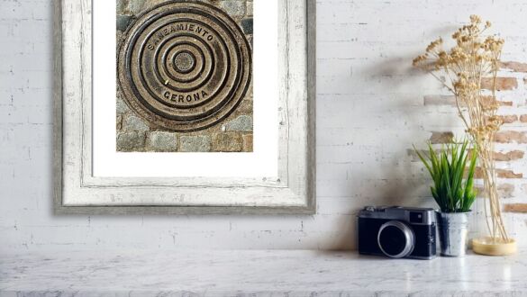 Girona Historic Manhole Cover and Cobblestone Street Detail in Catalonia Spain Fine Art Print